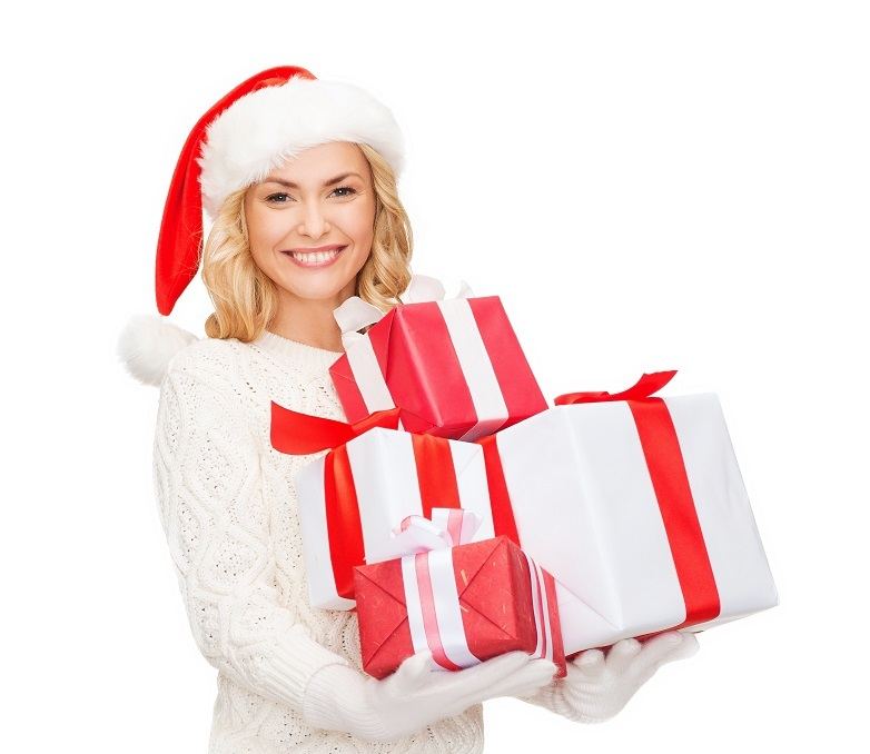 beautiful young woman holding gift wrapped present