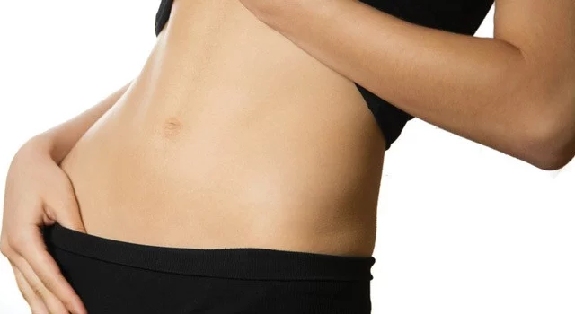 woman's abdomen after Mons Lift Plastic Surgery at artemedica in sonoma county