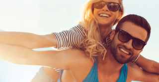 happy couple at the beach