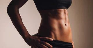 close up of a female body with strong abdominal muscles