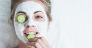 Woman enjoying a mini exfoliating facial from Artemedica at home