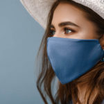 Woman wearing stylish protective face mask