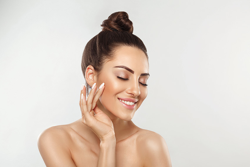Beautiful women with youthful, healthy looking skin clear and brilliant complete treatment with TOUCH laser