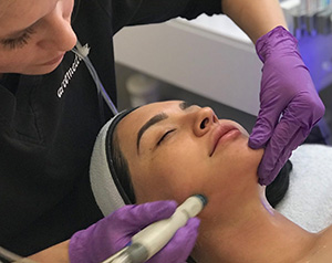 beautiful women at Artemedica medspa receiving a relaxing Hydrafacial MD skincare treatment at Artemedica Healdsburg