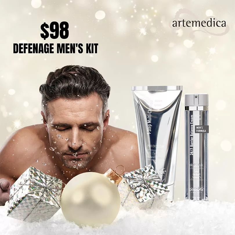 Shirtless man leaning forward with eyes closed, water droplets falling from his face, holiday motif: "$98 Defenage Men's Kit" 