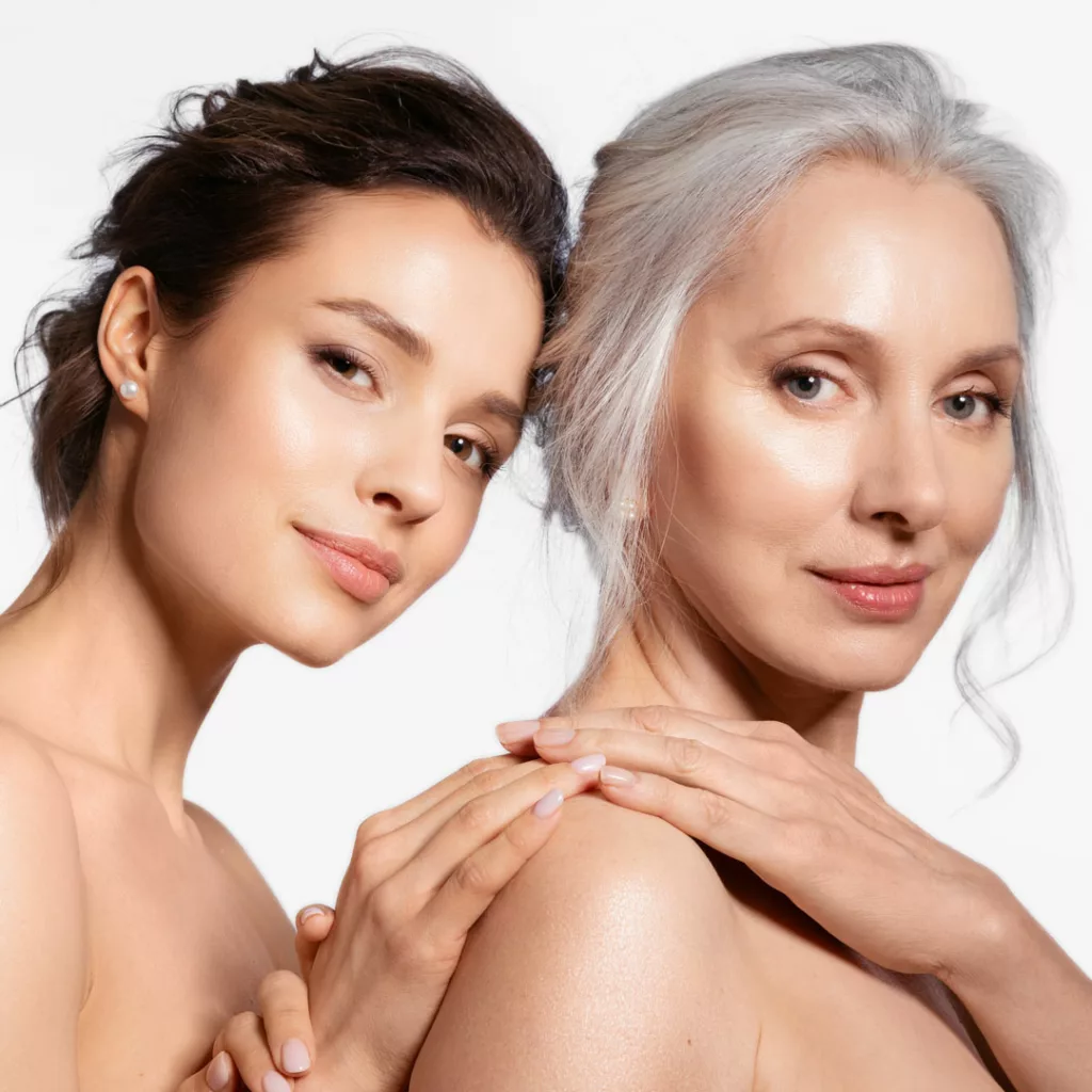 young woman side by side with a more mature woman