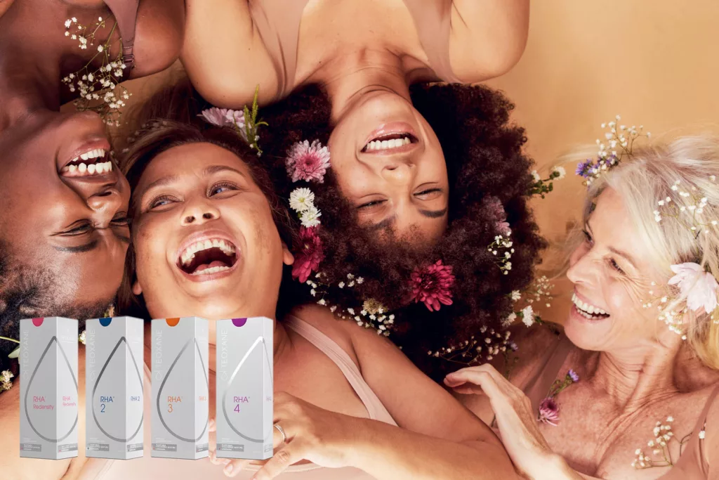 women of various ethnicities and ages laughing together