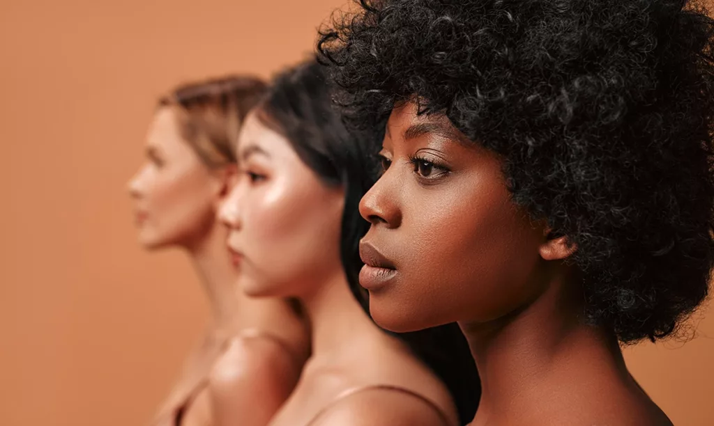 Three beautiful women with healthy, glowing skin