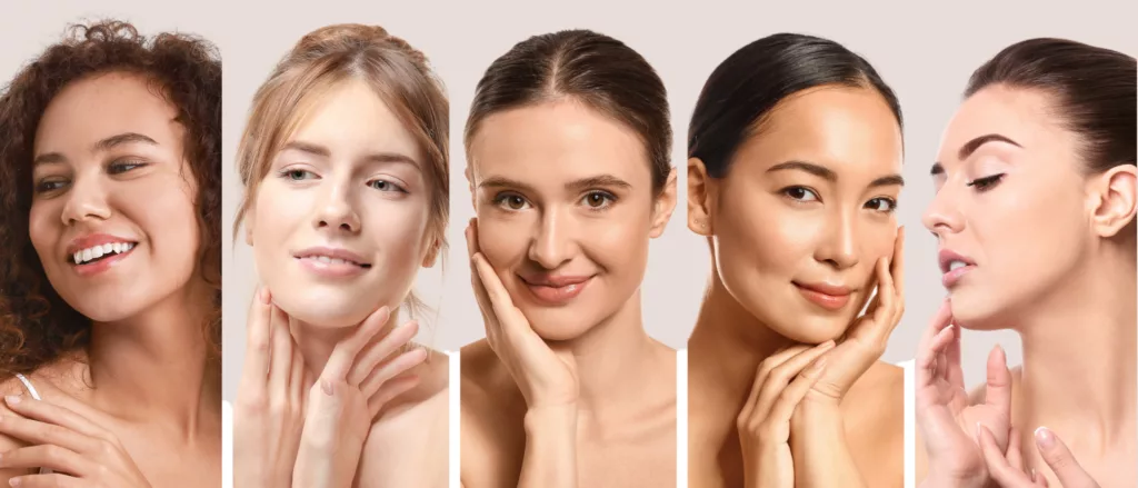 A group of five smiling women with clear, smooth skin, happy with botox results.