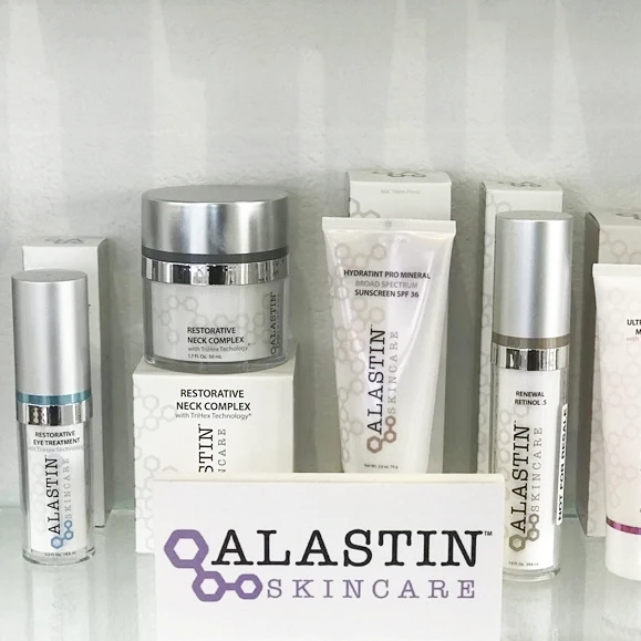 A lineup of Alastin skincare products against a white background